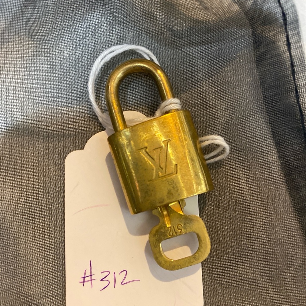 Authentic Louis Vuitton working lock with key, numbered 312